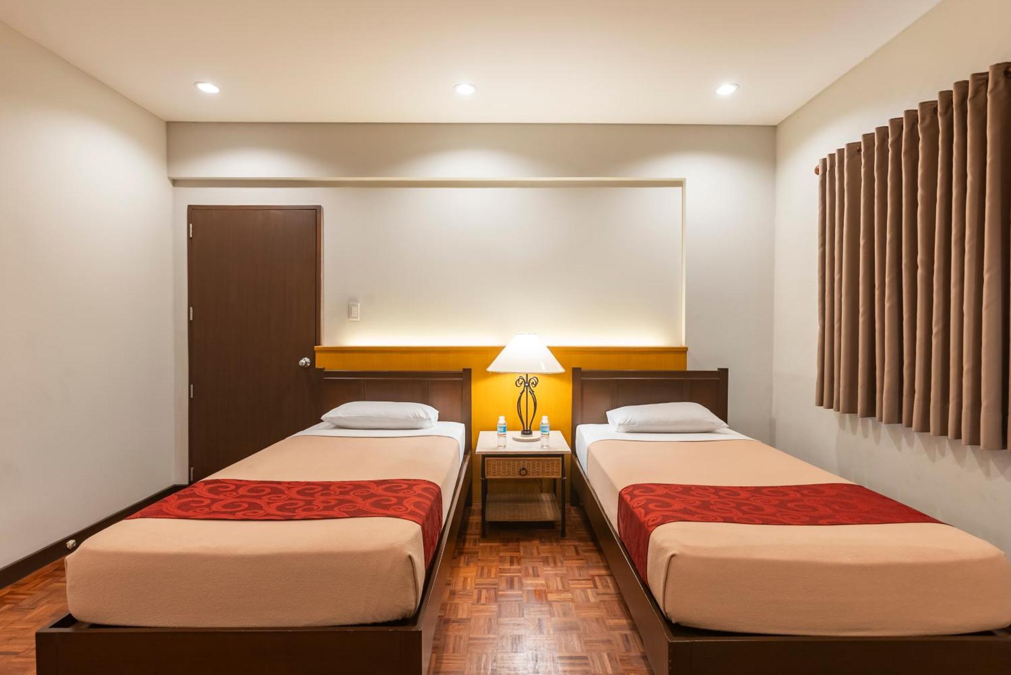 Tropicana Suites - Multiple Use Hotel Manila Habitación foto